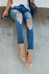 Calça Jeans Slim Rasgada