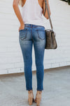 Calça Jeans Slim Rasgada