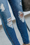Calça Jeans Slim Rasgada